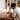 A Muslim couple playing the intention. conversation card game at home