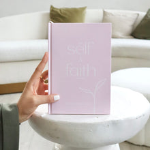 The Self and Faith Journal Blush Pink held up showing front cover - 90-day guided Islamic journal product photo #color_blush-pink